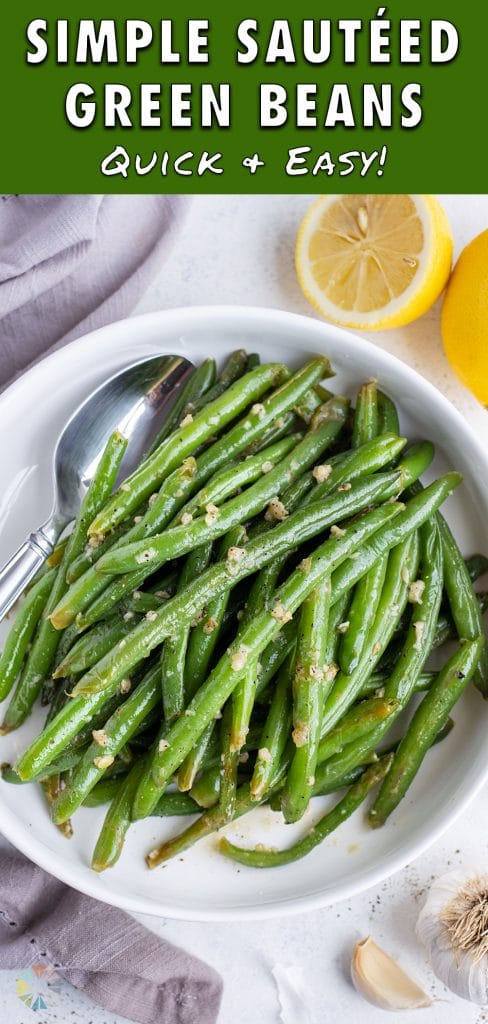 A white bowl is filled with tender and flavorful green beans.