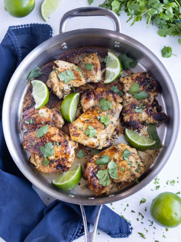 A skillet is used to cook crispy Cilantro lime chicken.