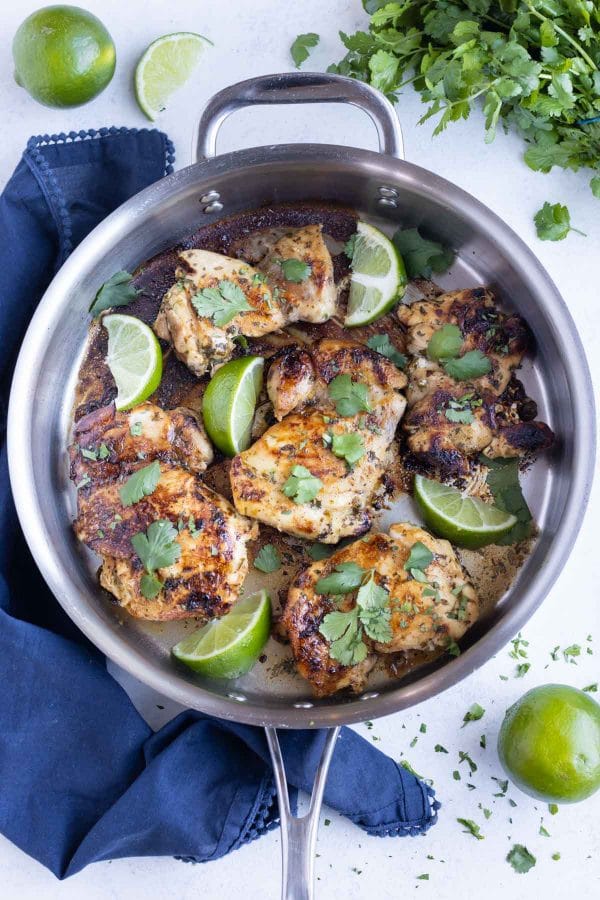 A skillet is used to cook crispy Cilantro lime chicken.