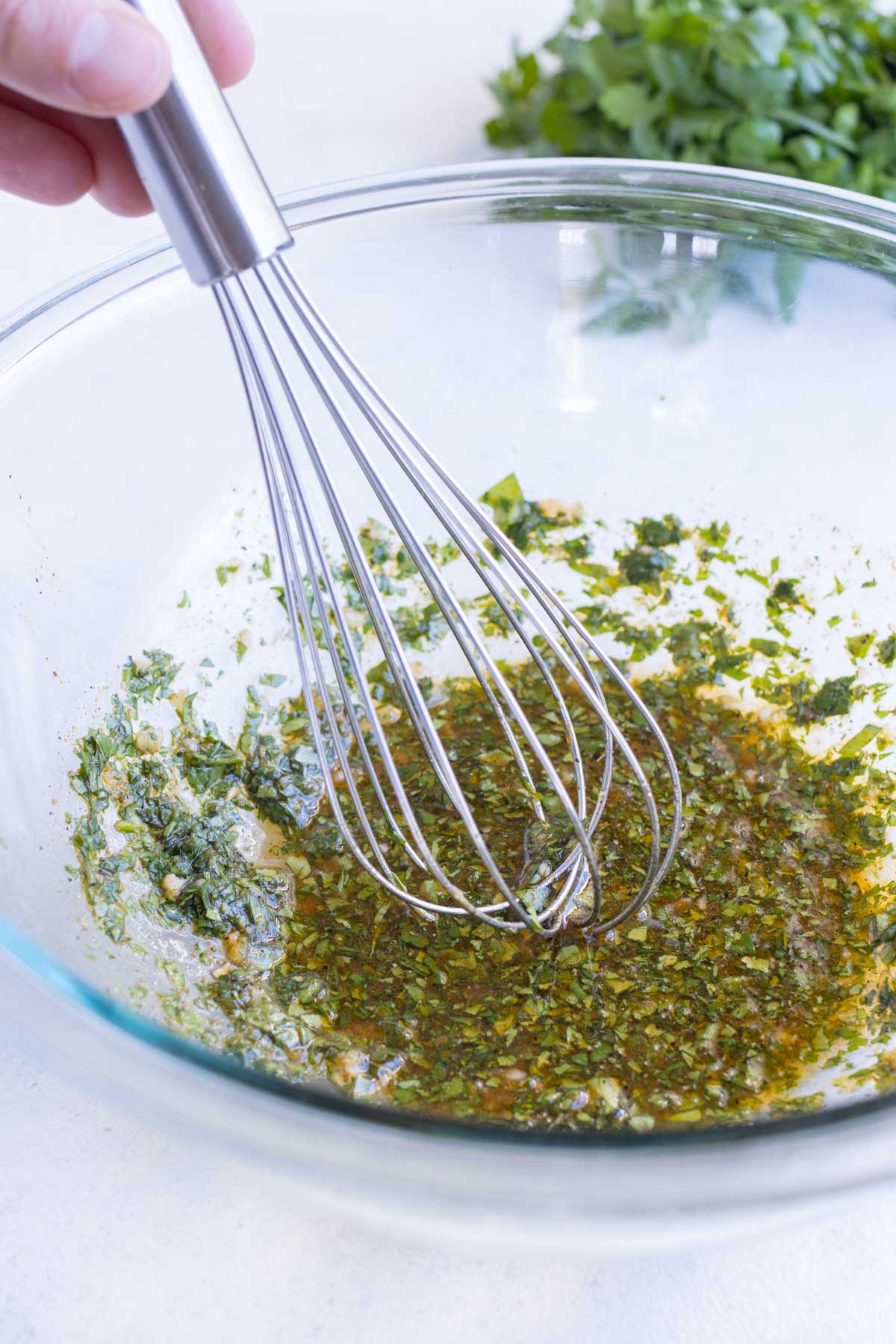 Cilantro is mixed into the sauce ingredients.