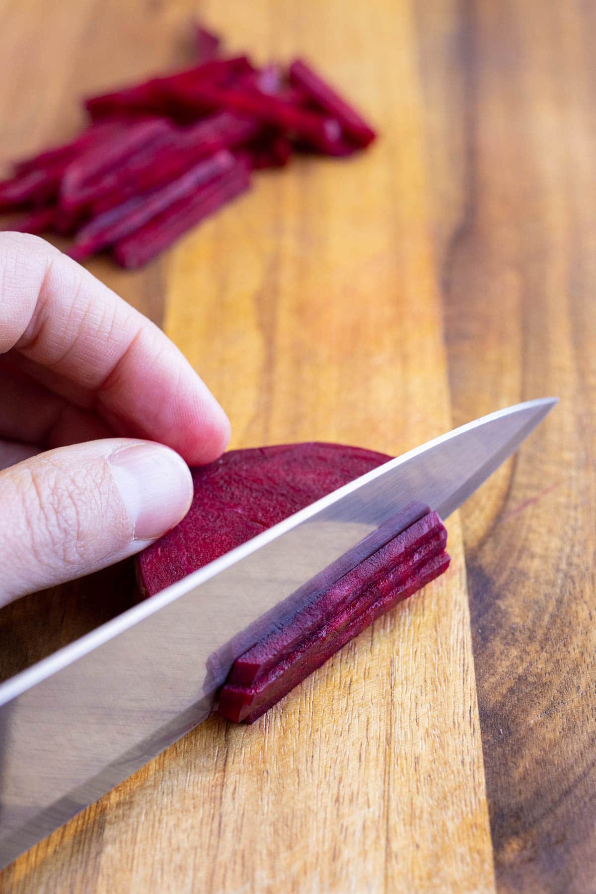 Beets are cut into thin and even strips.