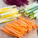 Fresh Julienne cut vegetables are shown before using in a recipe.