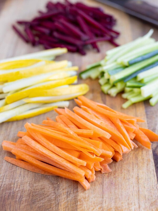Fresh Julienne cut vegetables are shown before using in a recipe.