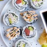 A plate is used to serve homemade sushi rolls.