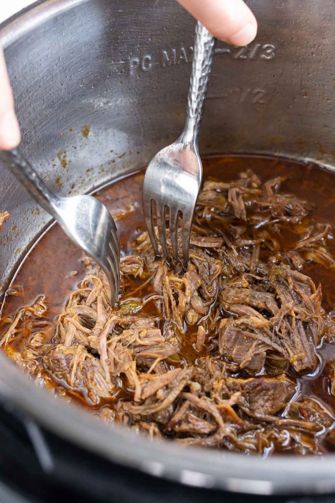 Pressure cooker Barbacoa is easily made in the pressure cooker for dinner.