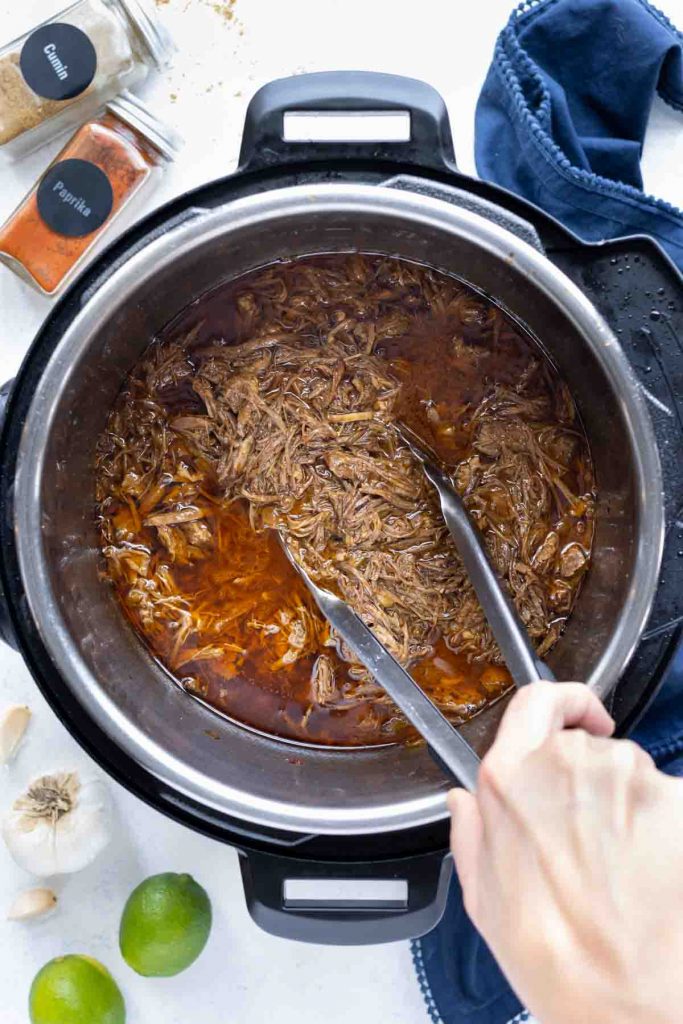 Pressure cooker barbacoa is served for an easy Mexican dish.
