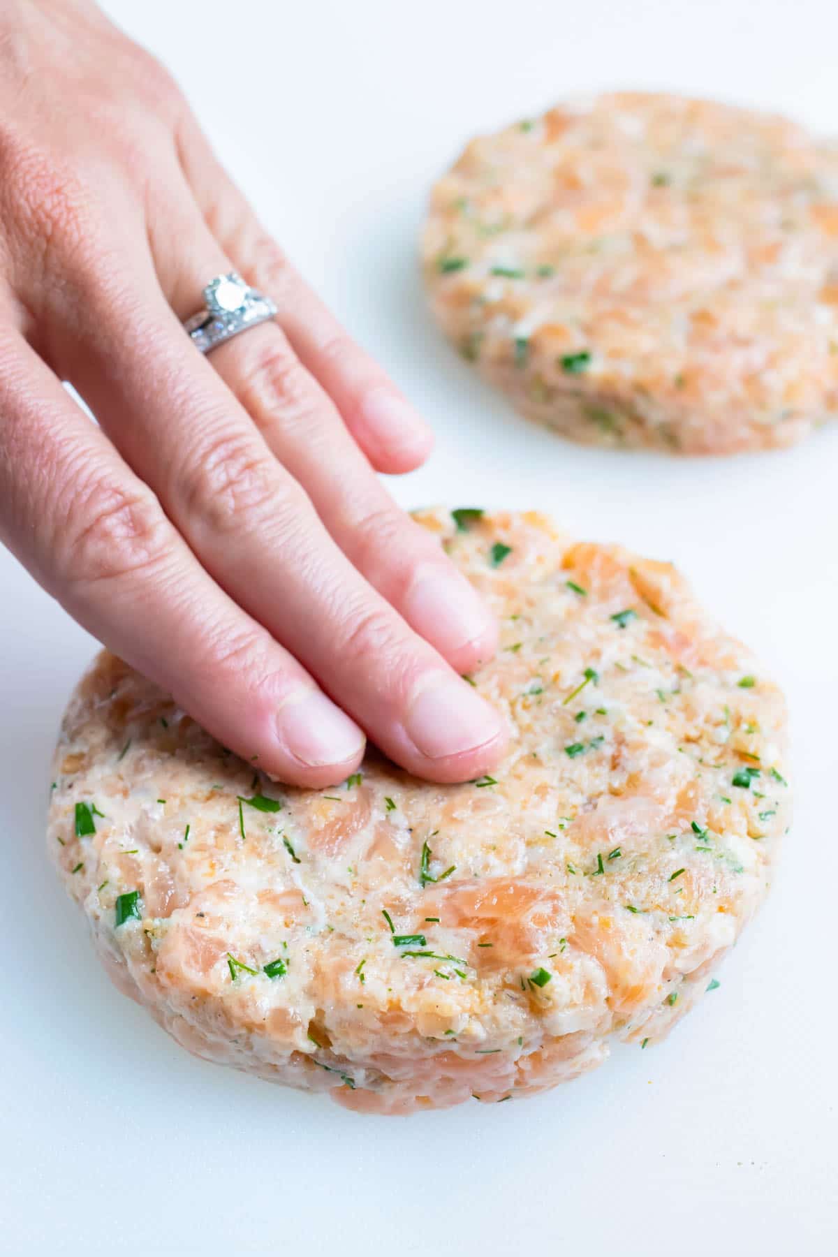 Burgers are formed with your hand to even sizes.