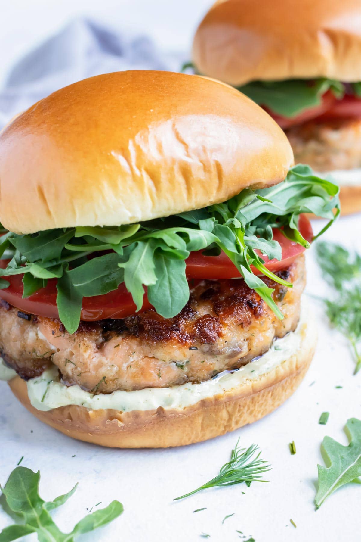 Salmon burgers are served for a healthy seafood dish.
