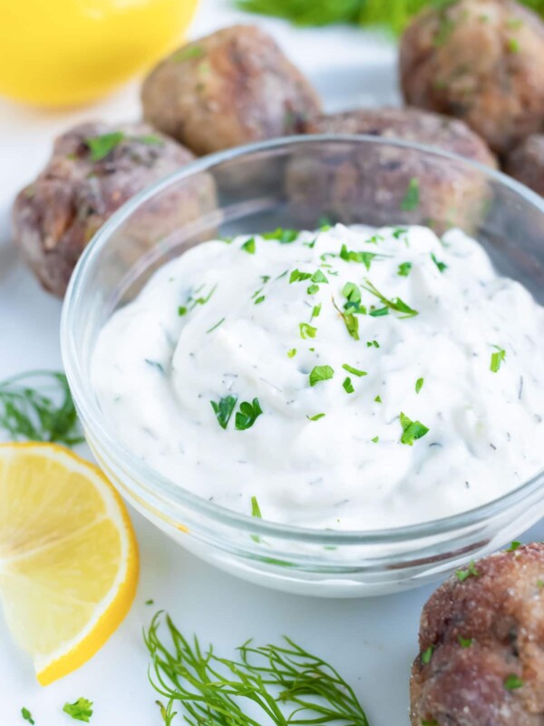 Tzatziki sauce is loaded with dill, cucumber, lemon, and greek yogurt for an authentic mediterranean dip perfect for your Greek recipes.