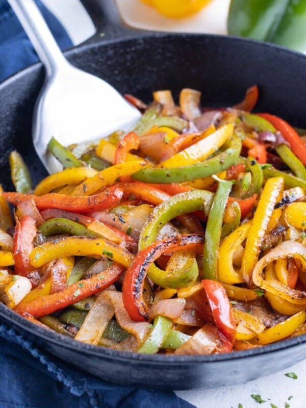 Vegetables are cooked until tender in a cast-iron skillet.