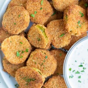 An overhead shot shows a plate of air fryer pickles.