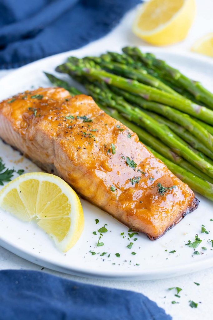 Glazed salmon is served for a spring meal after cooking in the air fryer.