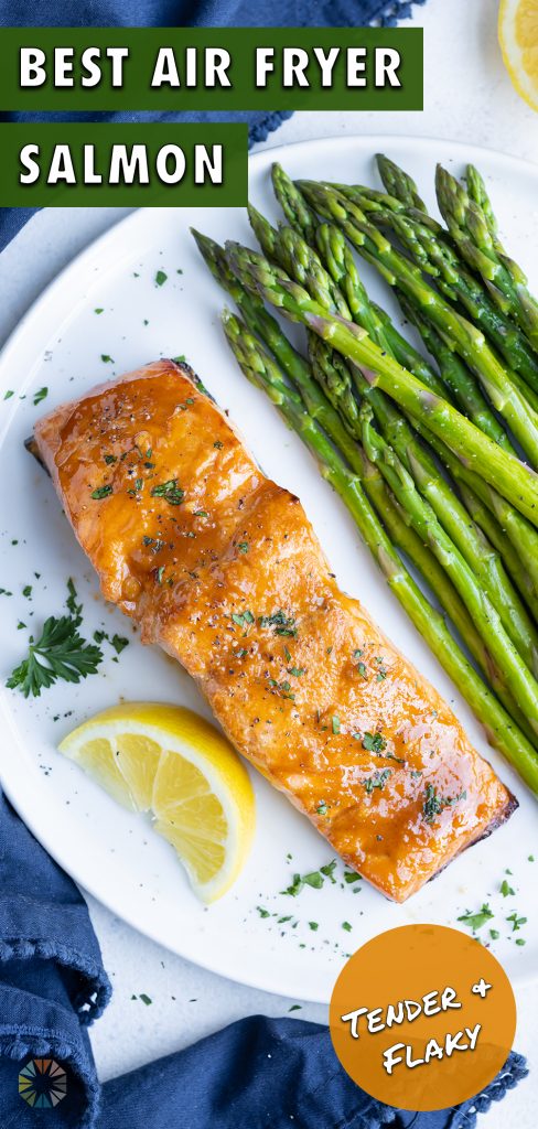 Asparagus is paired with tender and flaky Air Fryer Salmon.