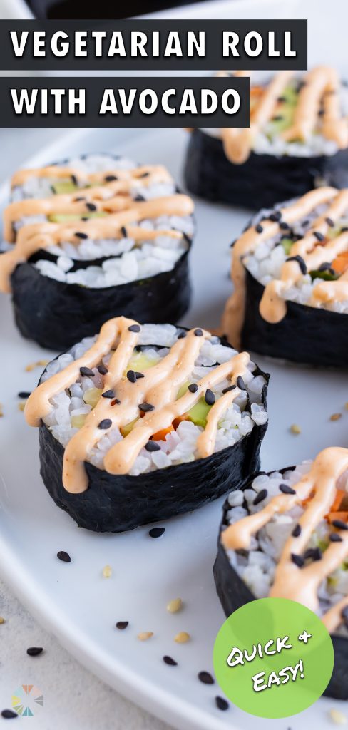 Avocado rolls are served with soy sauce and topped with wasabi.
