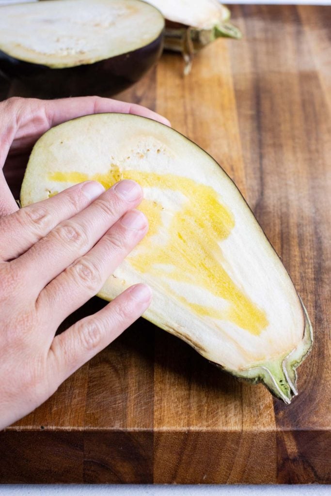 Showing the inside of a sliced eggplant.