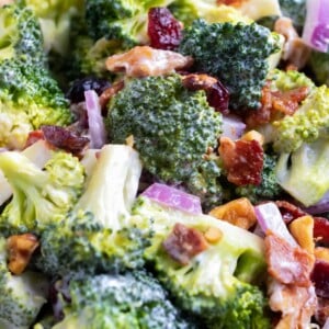 Broccoli bacon salad with a creamy mayo and yogurt dressing with walnuts and cranberries.