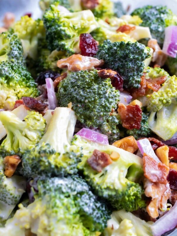 Broccoli bacon salad with a creamy mayo and yogurt dressing with walnuts and cranberries.