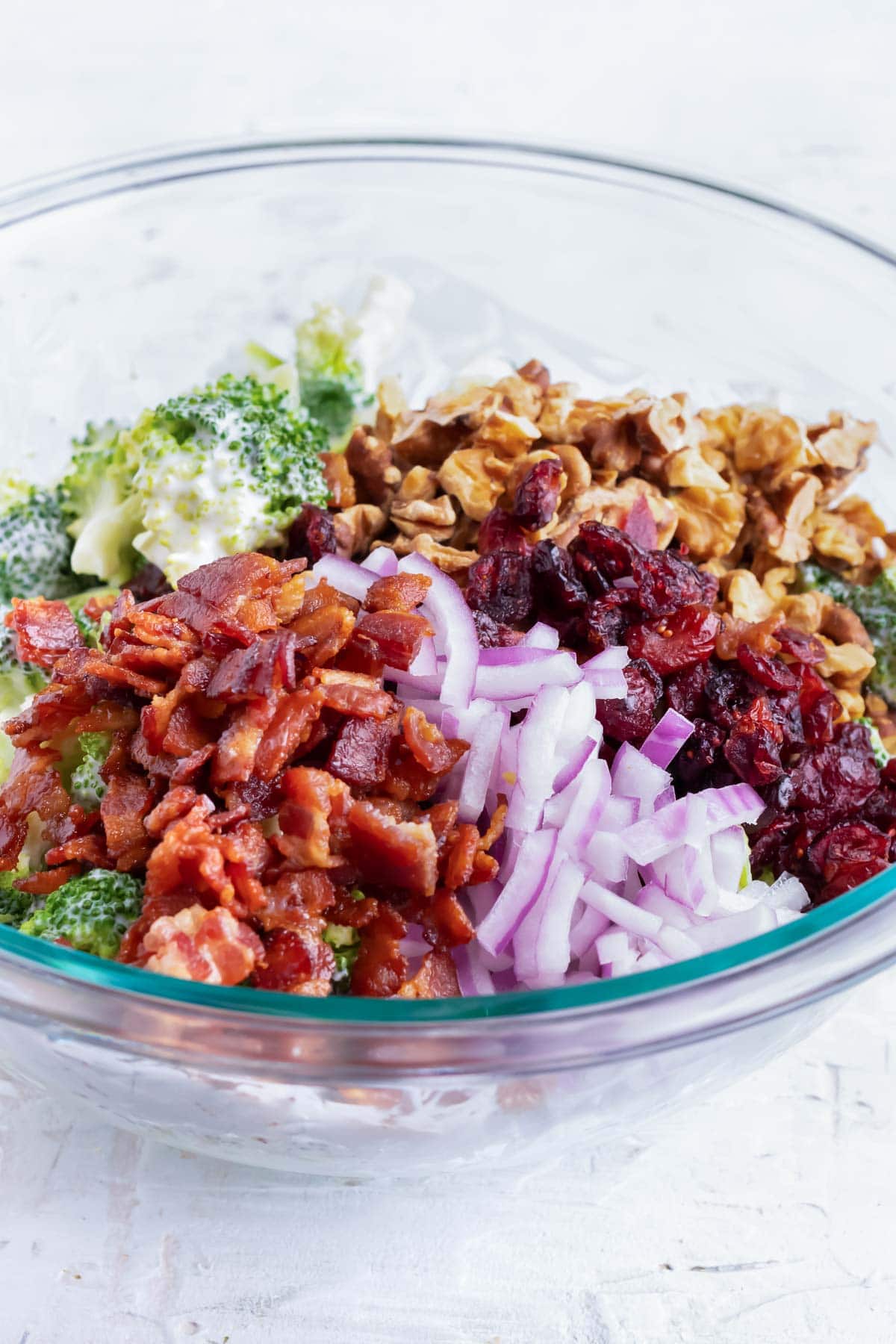 Combine colorful and healthy toppings in a broccoli salad.