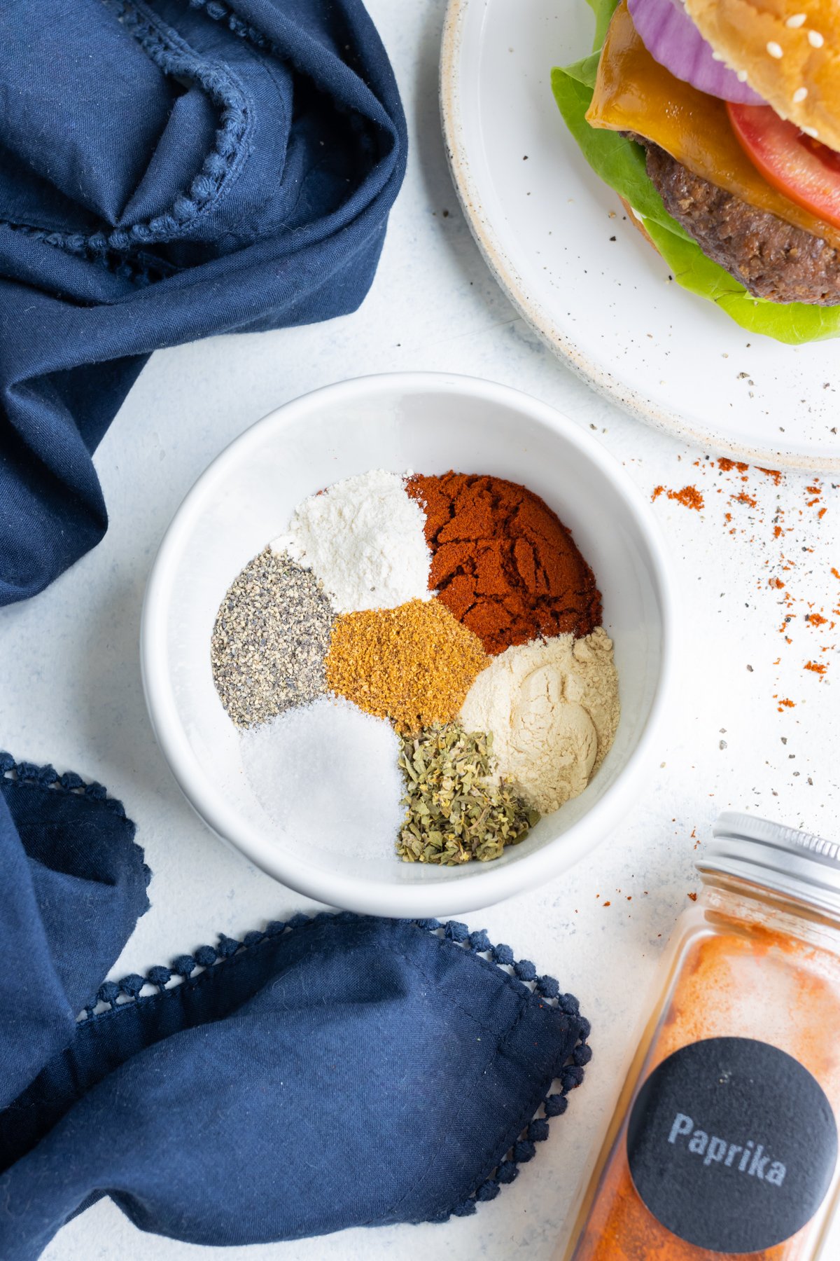 An overhead picture shows all the different spices used in this burger seasoning recipe.