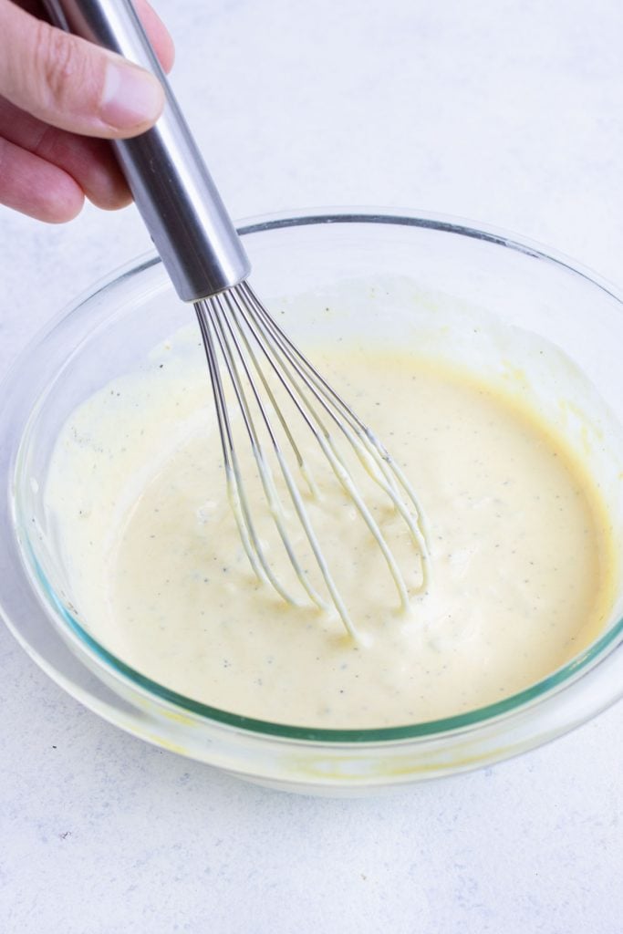 Creamy mayo and mustard dressing whisked smooth for Instant Pot potato salad.