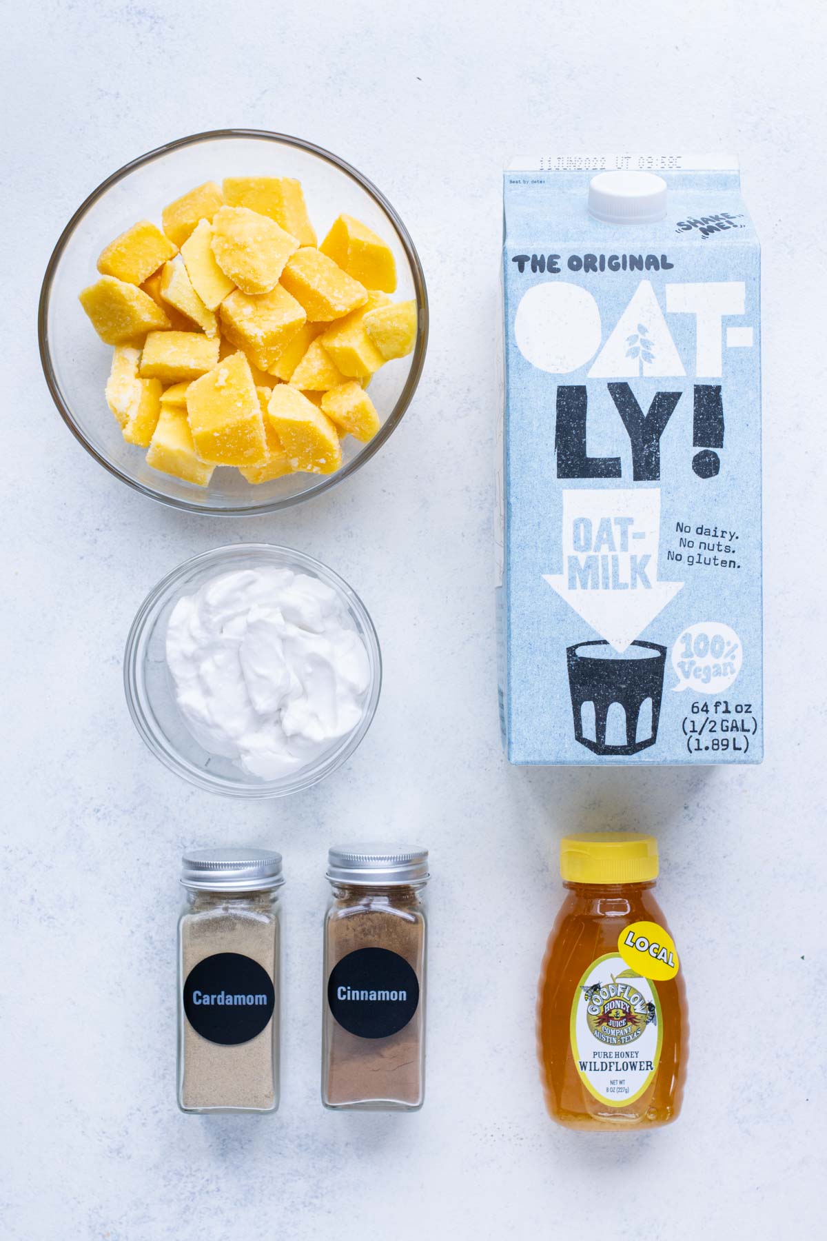 Mango, milk, honey, yogurt, cinnamon, and cardamom are the ingredients in this recipe.