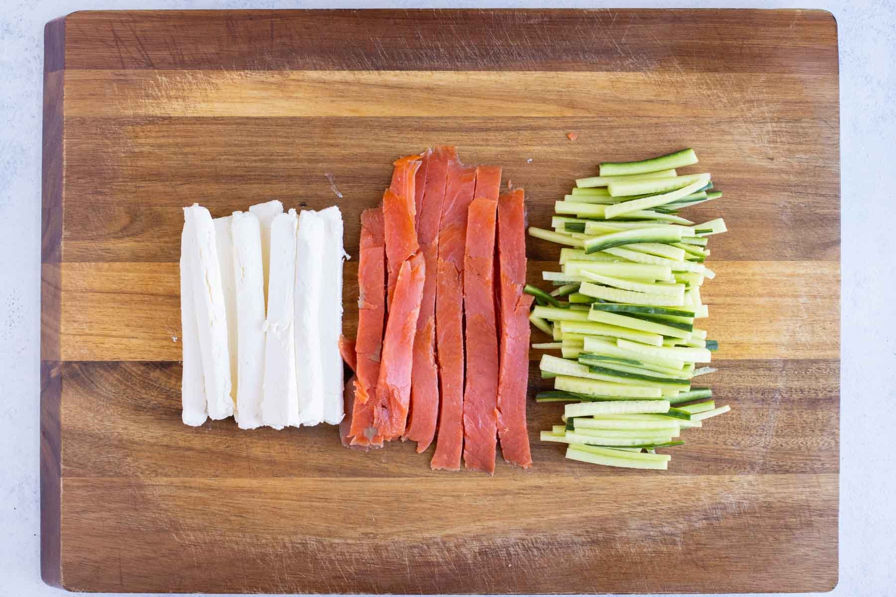 All ingredients are prepared on the cutting board.