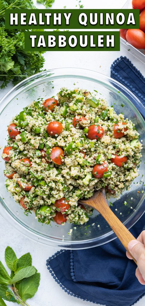 Quinoa tabbouleh is served in a white bowl for a vegan side dish.