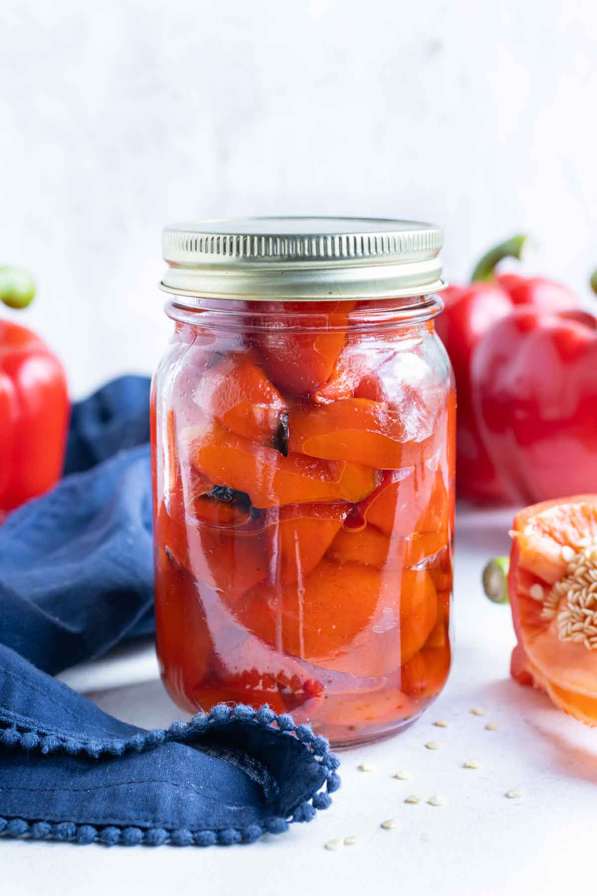A sealed jar with roasted peppers.