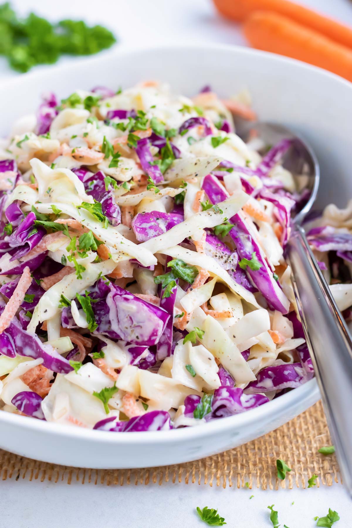 An easy coleslaw recipe with shredded cabbage and carrots, mayonnaise and mustard.