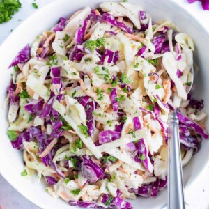 An easy coleslaw recipe with shredded cabbage and carrots, mayonnaise and mustard.