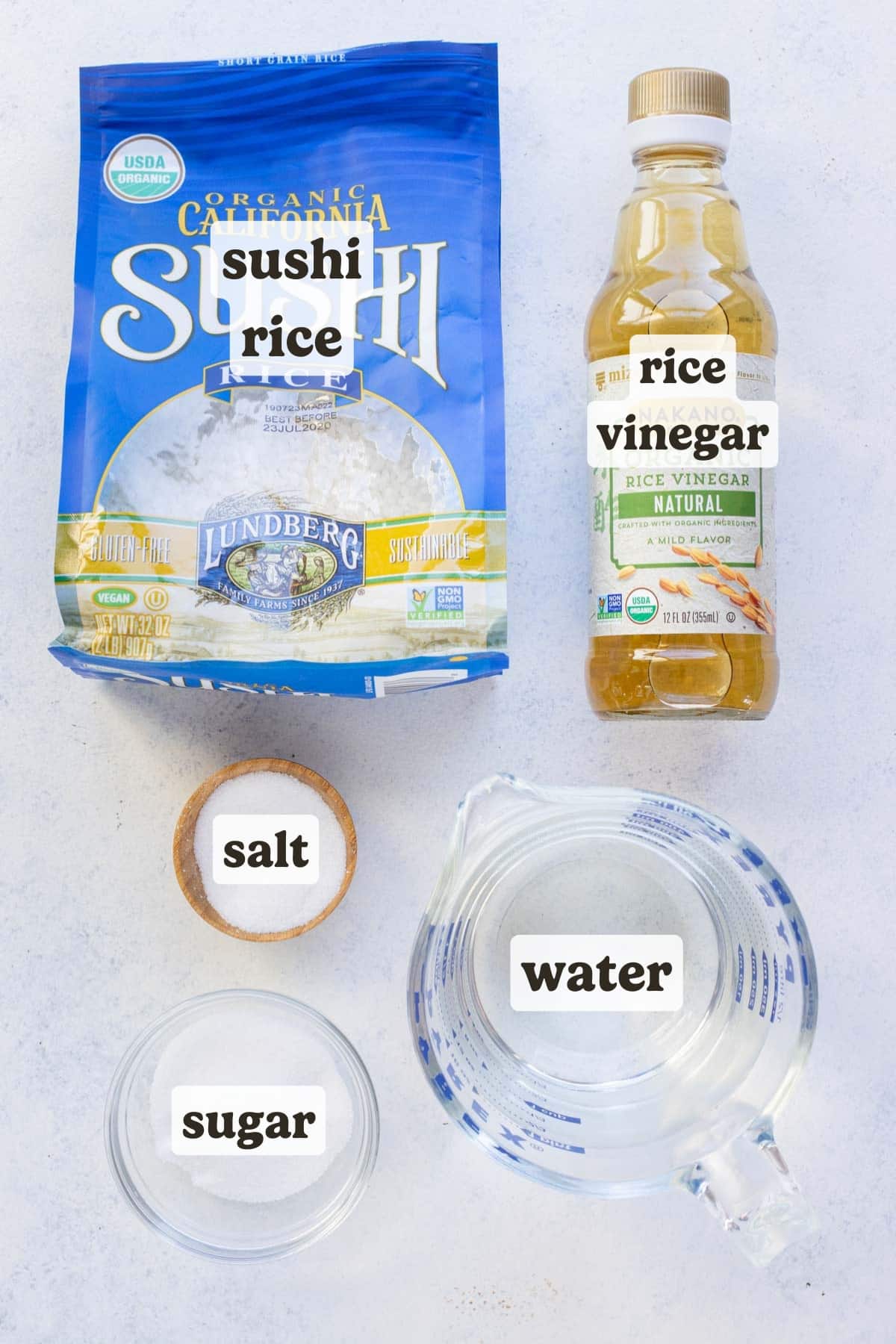 Rice, vinegar, water, salt, and sugar are the ingredients for this sushi rice recipe.