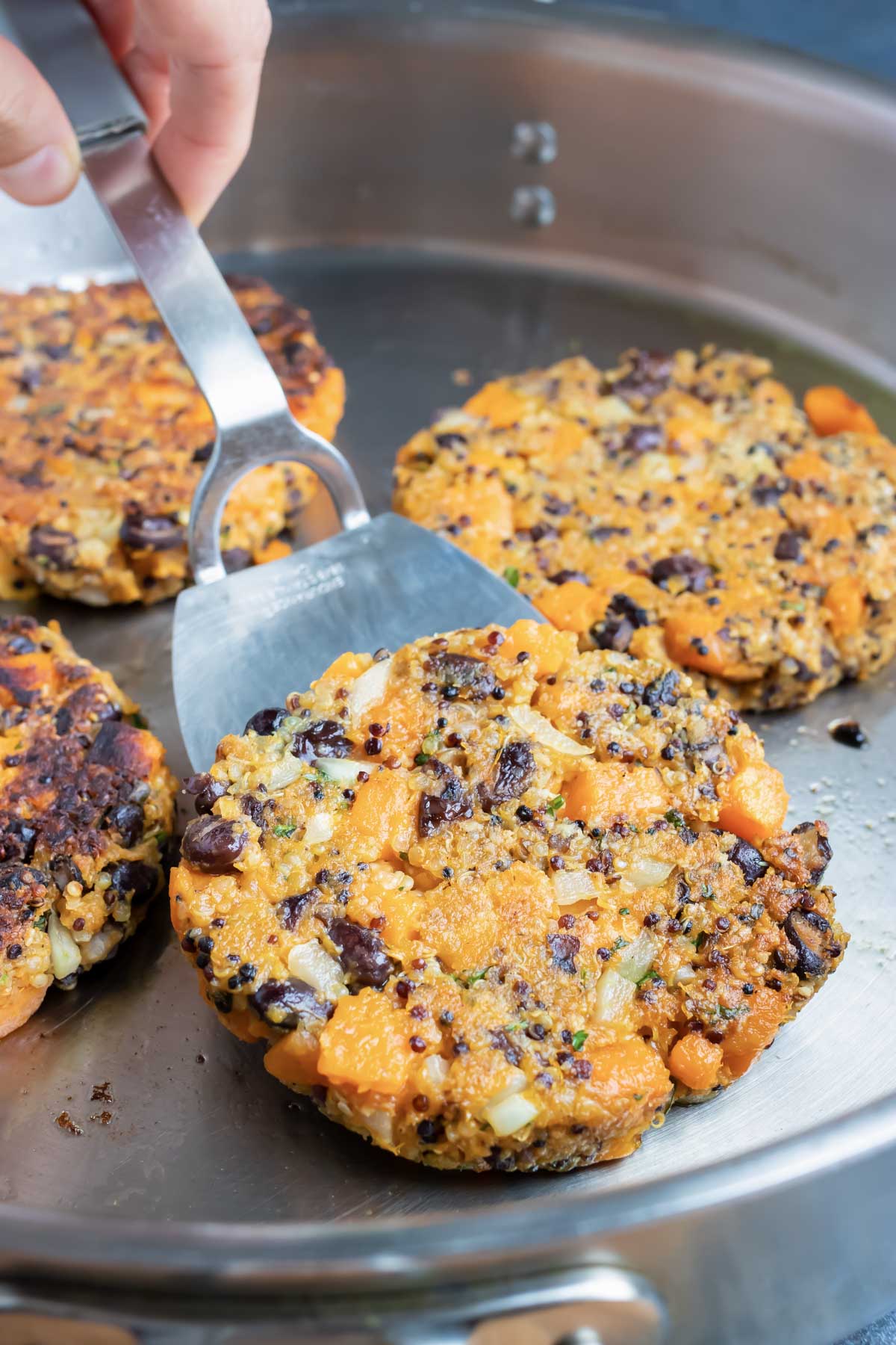 Cooking sweet potato black bean burgers in a skillet, on a baking sheet, or on the grill.