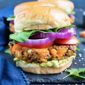 A sweet potato burger with black beans on a gluten-free hamburger bun.