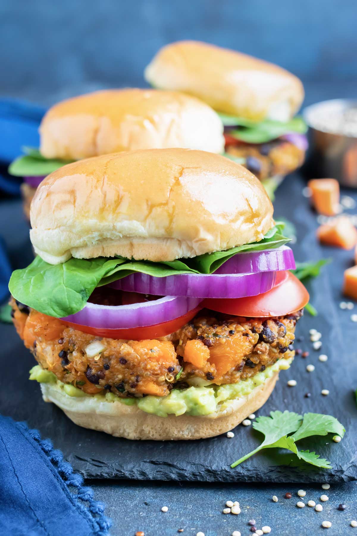 A sweet potato burger with black beans on a gluten-free hamburger bun.