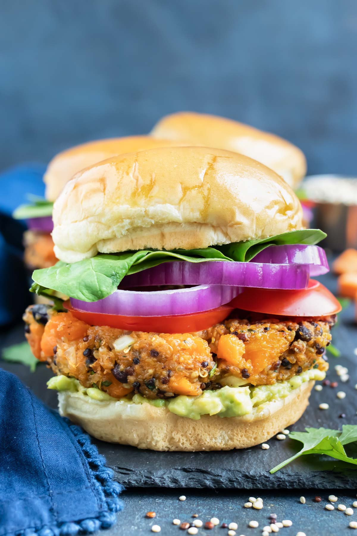 A sweet potato burger with black beans on a gluten-free hamburger bun.