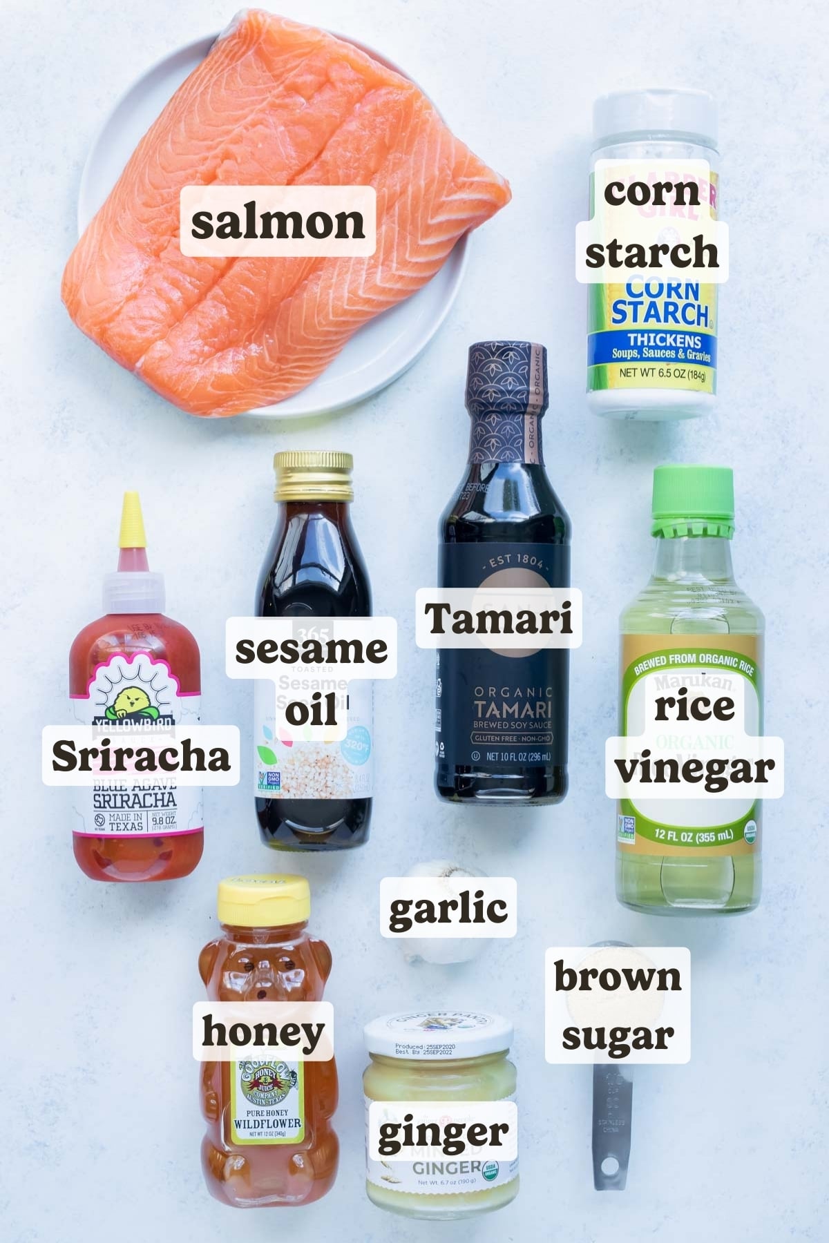 Salmon, honey, brown sugar, sriracha, soy sauce, garlic, and cornstarch are the main ingredients for this teriyaki salmon recipe.
