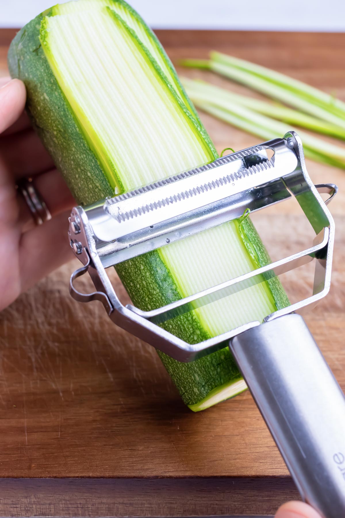How to use a julienne peeler to make zoodles.