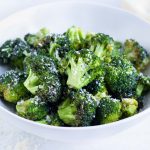 Air fryer broccoli is served in a white bowl for a low-carb side.