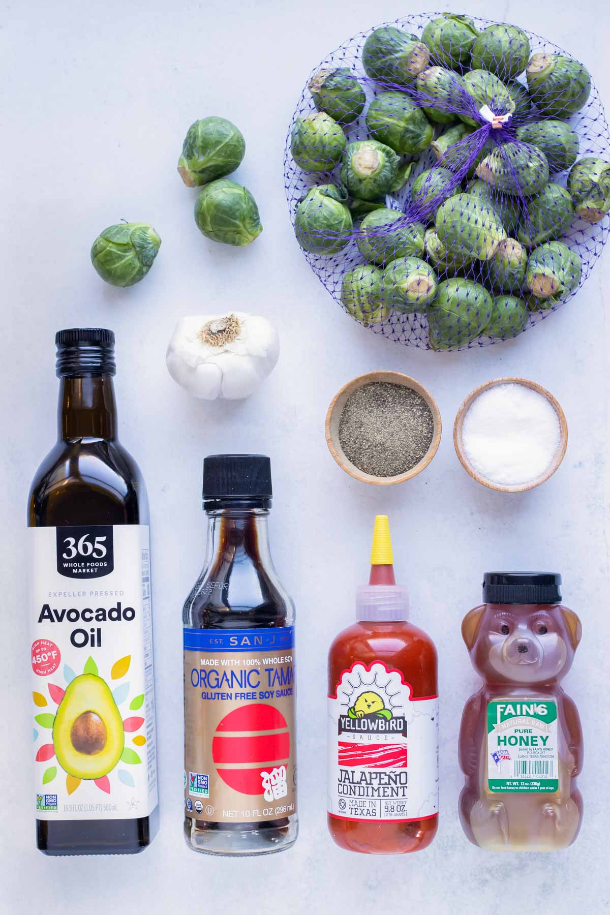 Avocado oil, Brussels sprouts, and salt are needed to cook, honey, sriracha, soy sauce and garlic are the ingredients for the sauce.