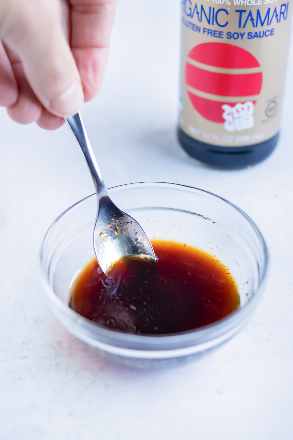 Sriracha, soy sauce, and honey are mixed for an Asian drizzle.