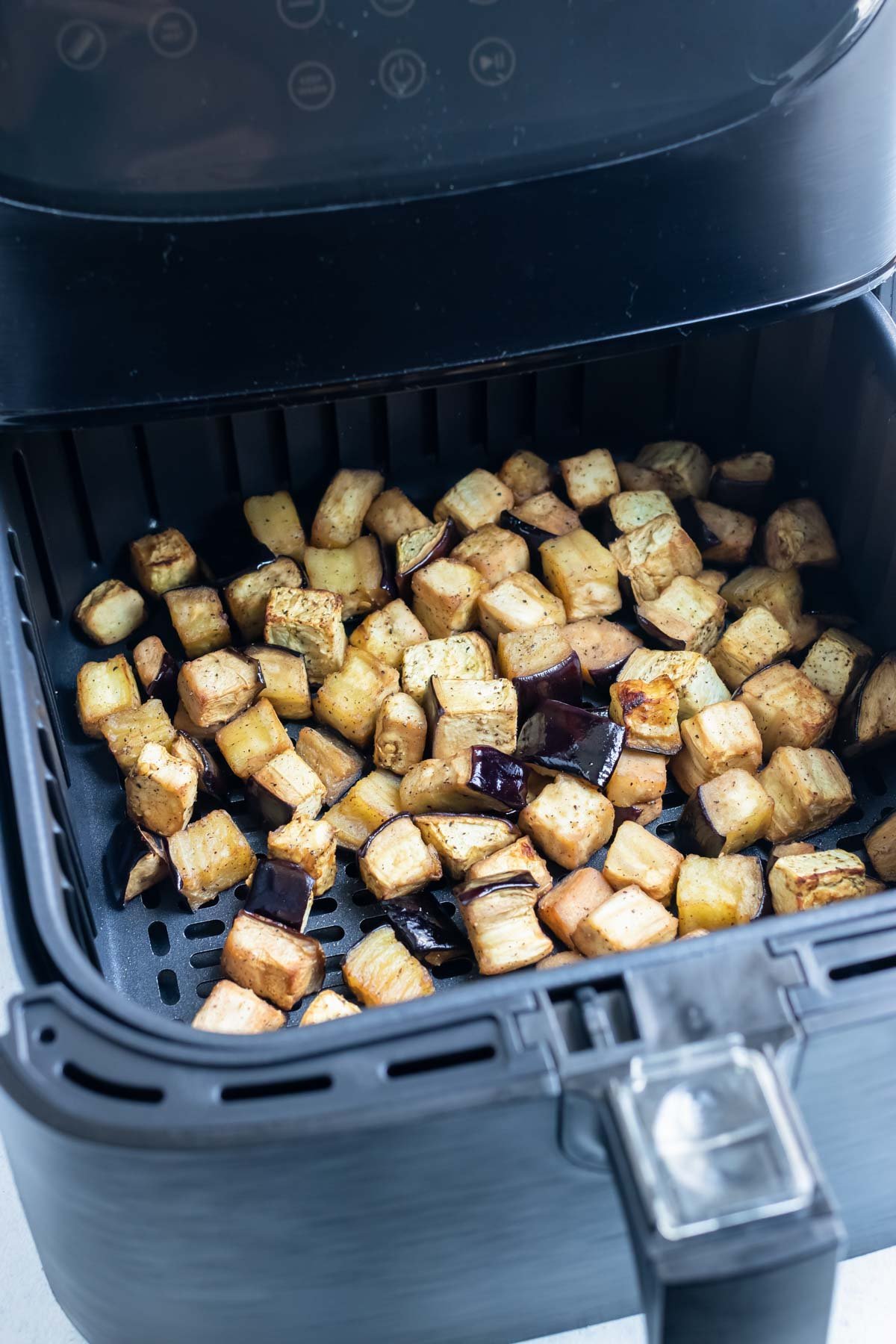 The eggplant is cooked in the air fryer for a healthy side.