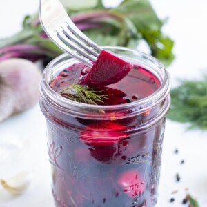 Roasted beets in a brine flavored with dill, garlic, and pepper.