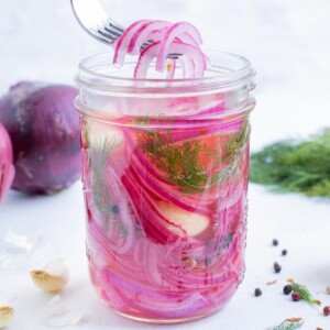 Pickled red onions are delicious on a variety of dishes.
