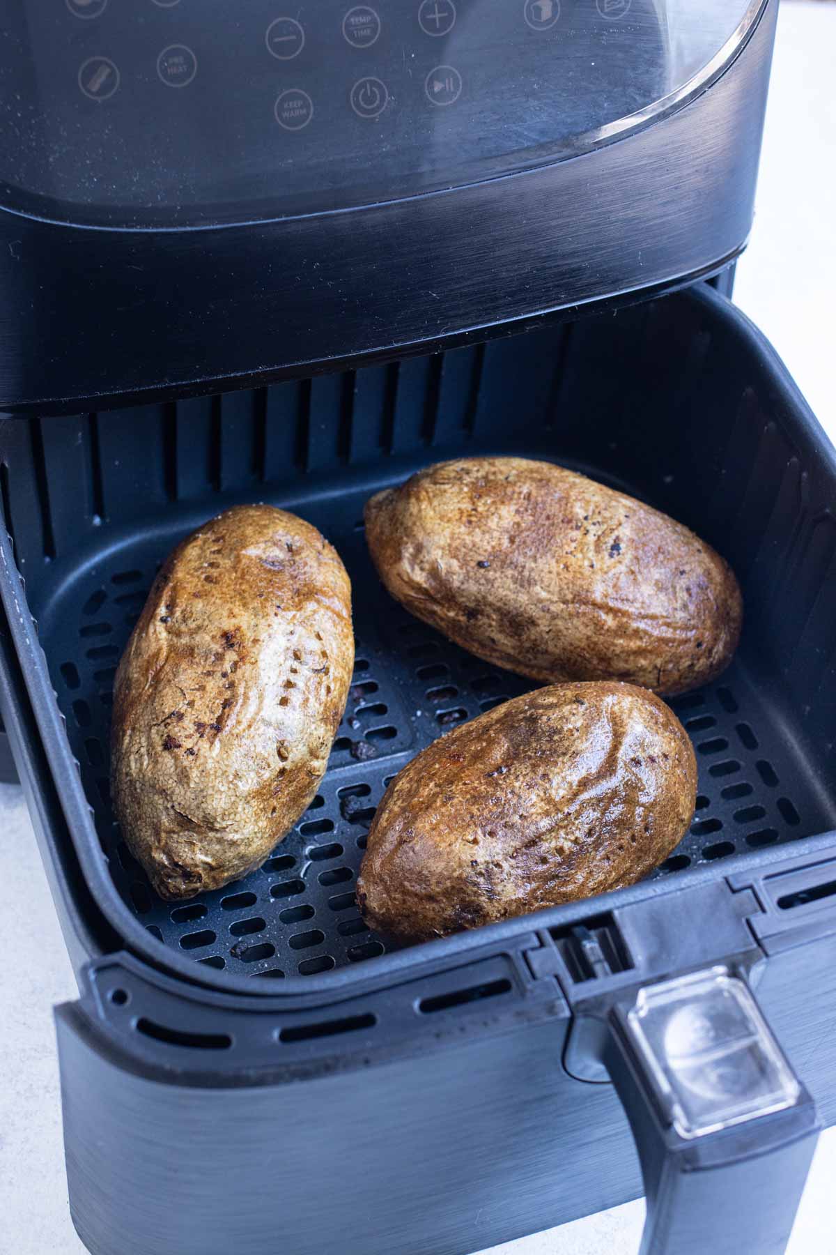 Crispy skin on potatoes after air frying.