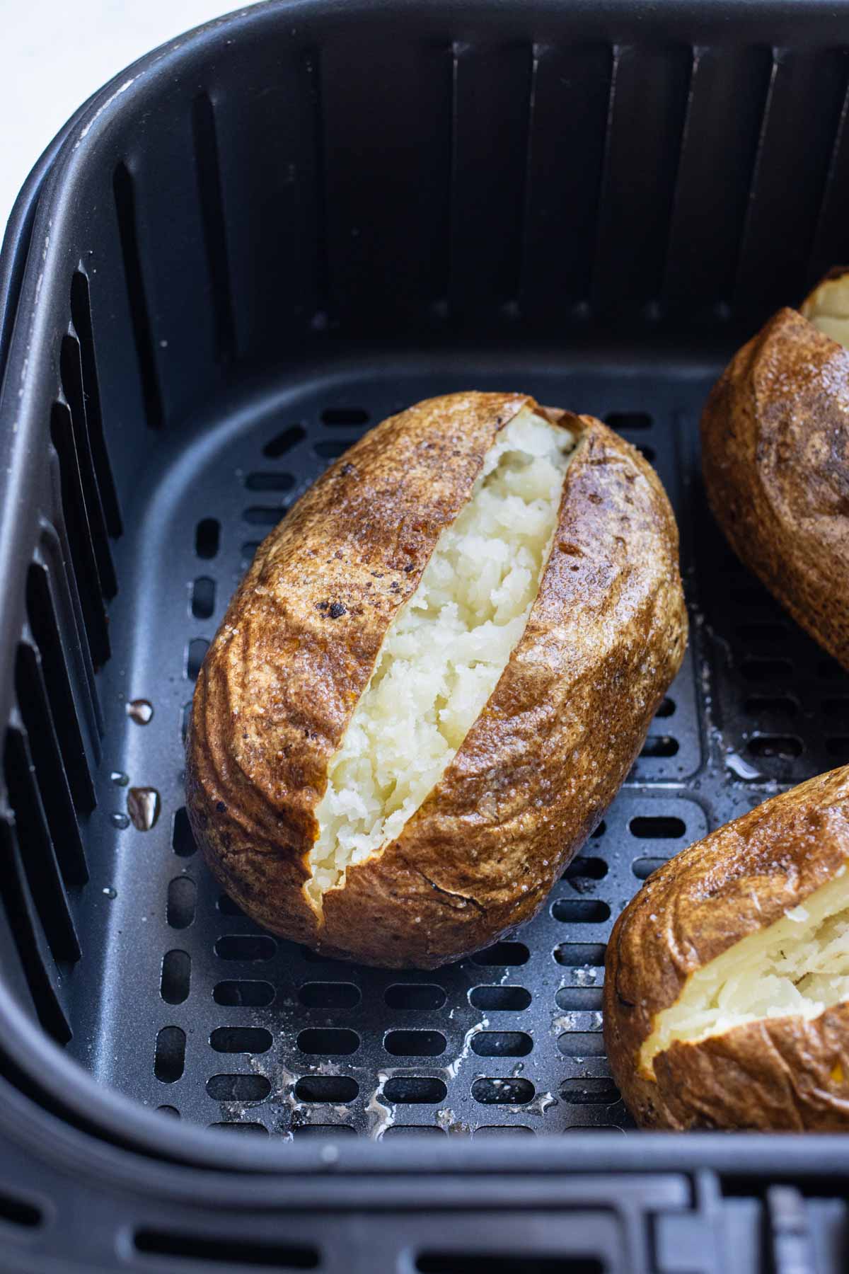 Air fryer baked potatoes are quick to make.