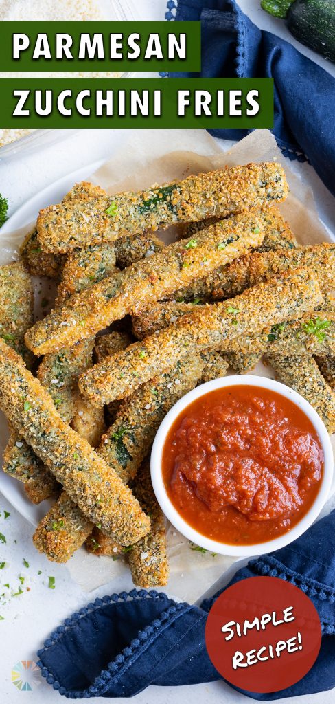 A plate full of baked parmesan zucchini fries.