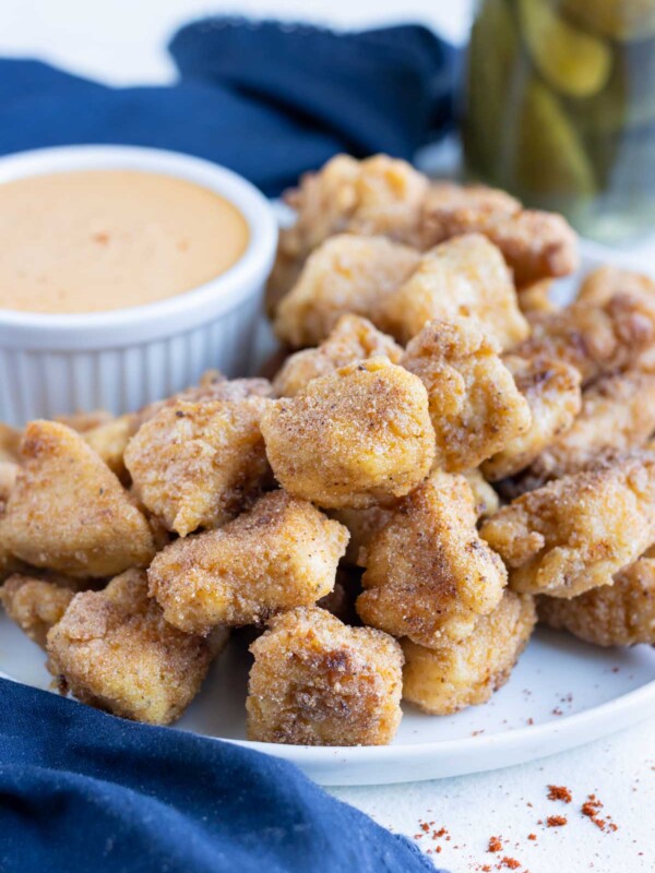 A plate is loaded with copycat Chick-fil-A nuggets.