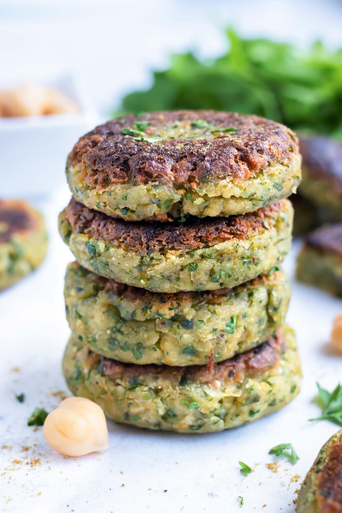 The best vegetarian falafel is stacked on the counter for an easy Mediterranean dish.