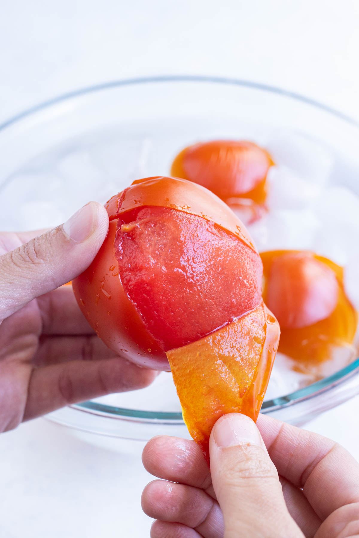 You can easily peel the skin off of a tomato.