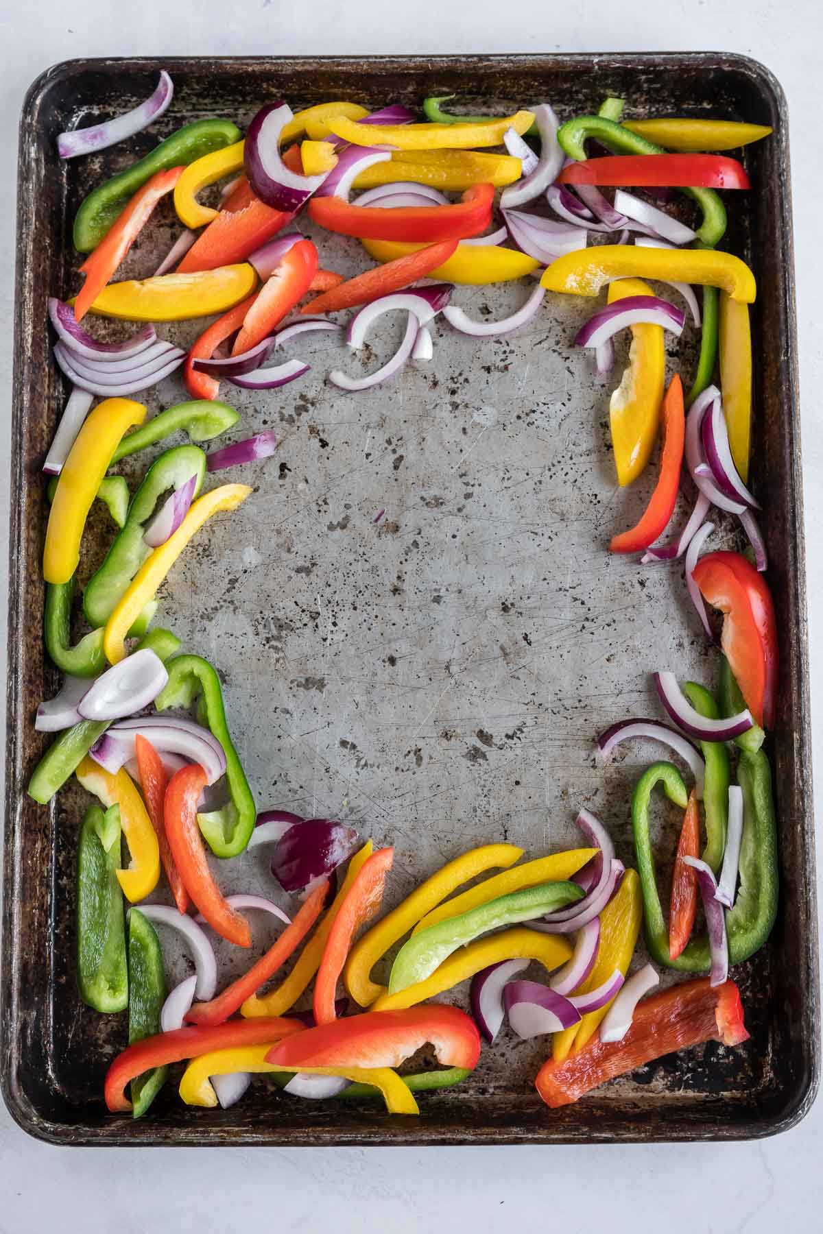 A pan with vegetables along the edge.